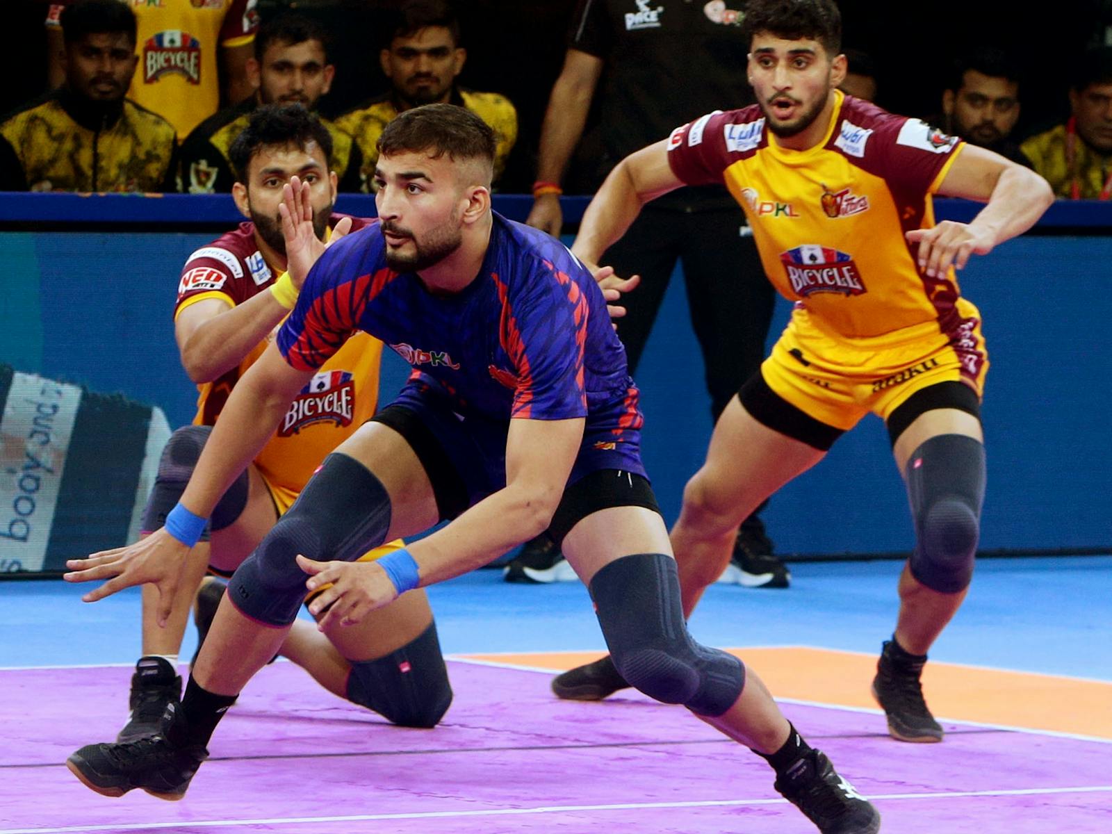 Kabaddi players battle it out