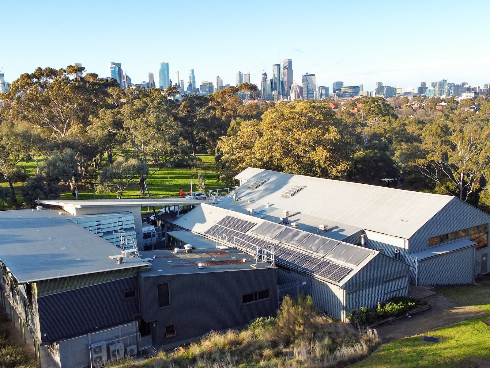 Urban Camp building with the city skyline.