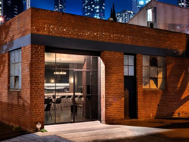 Patient Wolf Distilling Co. at night