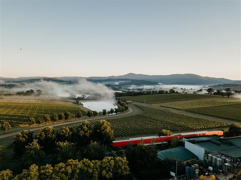 A drone image from above the venue looking out over the vineyard and Yarra Valley