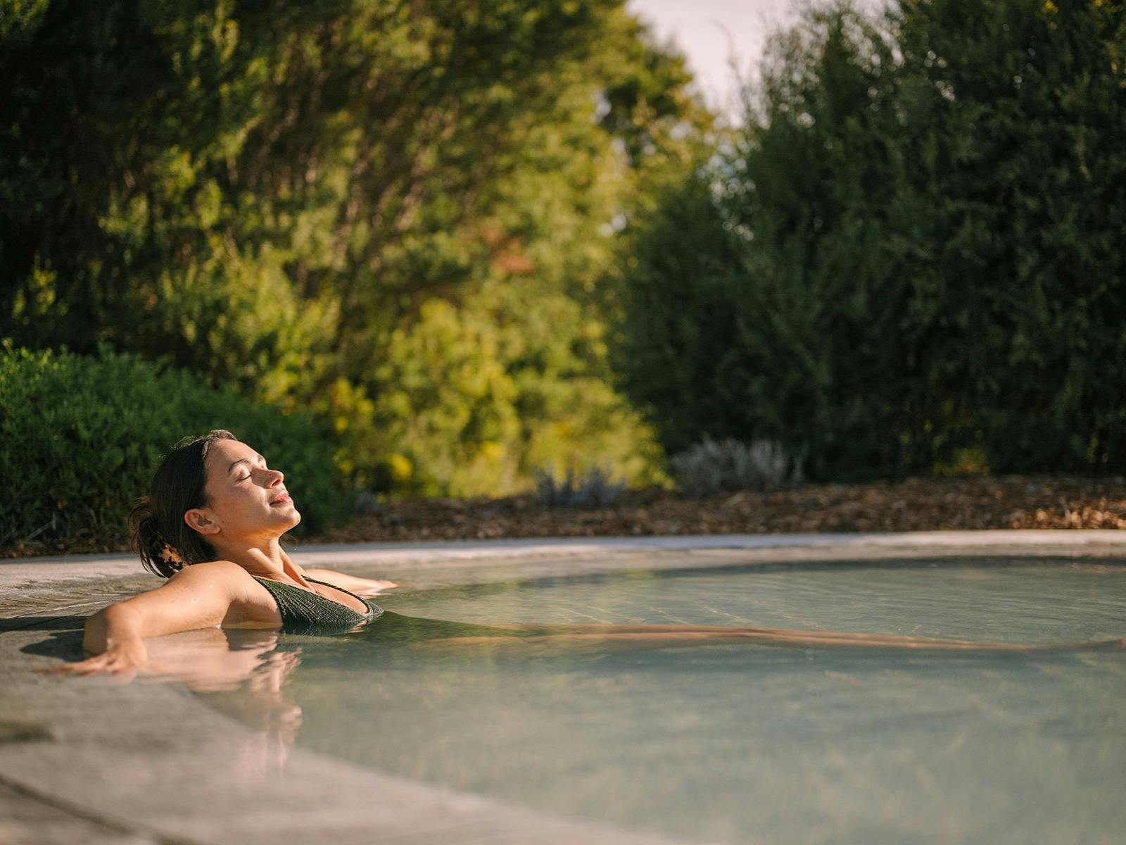 Women bathing in geo thermal pool