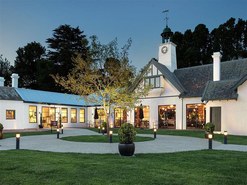 Courtyard view looking at the clocktower restaurant at sunset